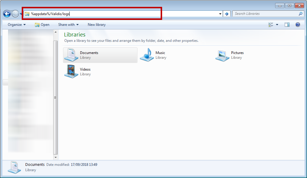 Entering the logs path in File Explorer's address bar.