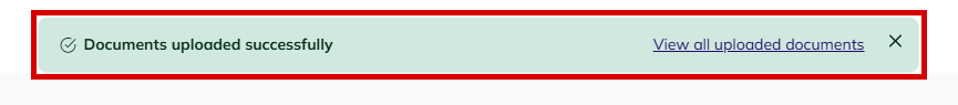 Documents uploaded successfully message highlighted at the top of the screen